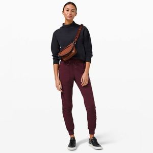 LULULEMON ATHLETICA ALL NIGHT MICRO FESTIVAL BAG IN DARK TERRACOTTA